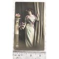 vintage postcard Woman standing by Column