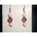 Vibrant pink with translucent purple short drop...