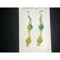 Large blended turquoise & yellow glass swing ea...