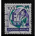 YUGOSLAVIA 1986 POSTAL SERVICE 1000d WOMAN USIN...