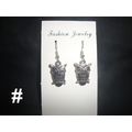 Original wide eyed long eared owl on branch sho...