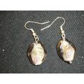 Unconventional white purple gold encased in gre...