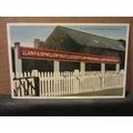 A STATION IN ANGLESEY, WALES used vintage postc...