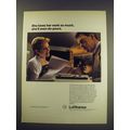 1991 Lufthansa Airline Ad - She loves her work so much, she'll even do yours