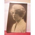 UNKNOWN YOUNG LADY WITH 'FLUFFED' UP HAIR? anti...
