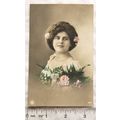 1911 Greetings postcard Woman with Flowers