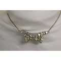 Faux diamond bow-tie shaped 15" choker with mat...