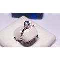 Estate 1/5ct Light Blue Topaz sculpted Bezel St...
