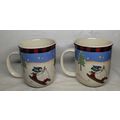 Set of 2 Snowmen Sledding Skiing Coffee Tea Mug...