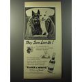 1953 Black & White Scotch Ad - They sure love us