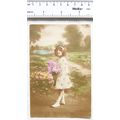 1918 coloured postcard - Girl Holding Flowers