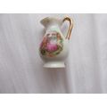 JUG / CERAMIC MINITURE DEPICTING TWO LOVERS (03...