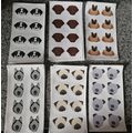 24 sheets of 8 vinyl stickers of dogs faces, ea...