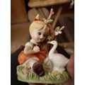 Small Ceramic Child With goose