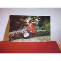 SAT ON A BRIDGE, WELSH NATIONAL COSTUME used po...