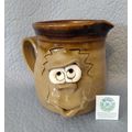 HANDCRAFTED WHIMSICAL FACE STONEWARE CREAMER PR...