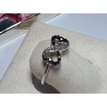 Natural .10cttw Black Diamond Infinity Sterling...