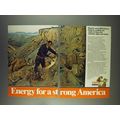 1978 Exxon Oil Ad - Bill Simms Reading Sands of Time