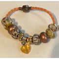 Brown & Orange Braided Orange Bracelet with Cha...