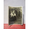 A MAN AND TWO WHITE RABBITS, 1930s? photograph =