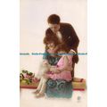 R091903 Old Postcard. Family. Woman Man and Dau...