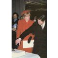 Princess Diana Cuts The Cake at Guildford Royal...
