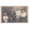 Man & Lady with Two Young Girls Studio Postcard...