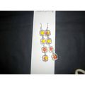 Electro plated orange on yellow faceted drum gl...