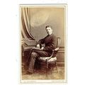 Victorian cdv photo young man seated legs cross...