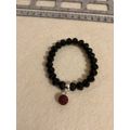 Black glass rondelle elastic bracelet with sham...