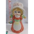 Vintage 4 1/2 inch ceramic girl with flower bas...