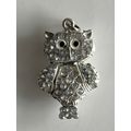 SILVER METAL CHARM WITH ARTICULATED HEAD & WINGS