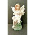 PRETTY WHITE SPARKLING FAIRY SITTING ON A CLEAR...
