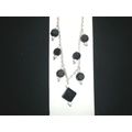 Simple plain black & white glass on silver plat...