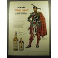 1957 Dewar's Scotch Ad - Piper at parade rest Clan Wallace Tartan