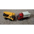 two tonka toy trucks