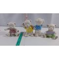 set of 4 handcrafted cermic bears 2 inches very...