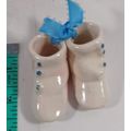 pair of old fashion baby booties minature glass...