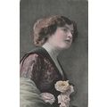 Head & Shoulders Of A Female Holding Some Roses...