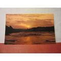 SUNSET OVER BRIXHAM, DEVON unused postcard Colo...