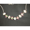 2 sets of contrasting handmade glass lampwork b...