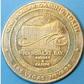 Mandalay Bay. $1 Casino Token. Las Vegas, NV. P96.